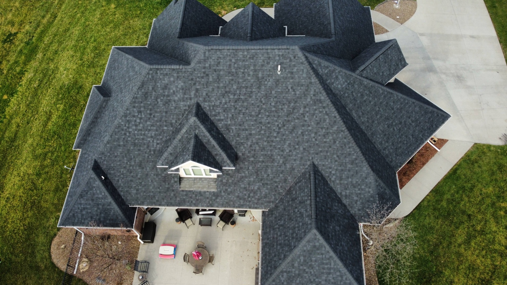 Aerial view of residential roof replacement by Blue Ox Roofing